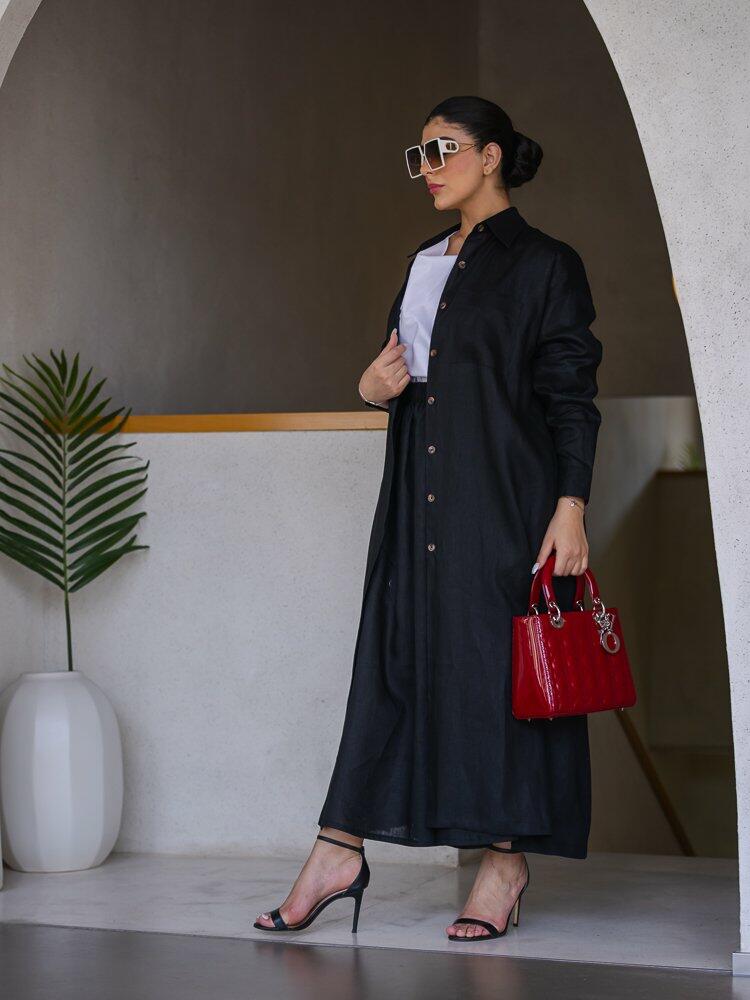 Black Buttoned Coat with a Modern Twist