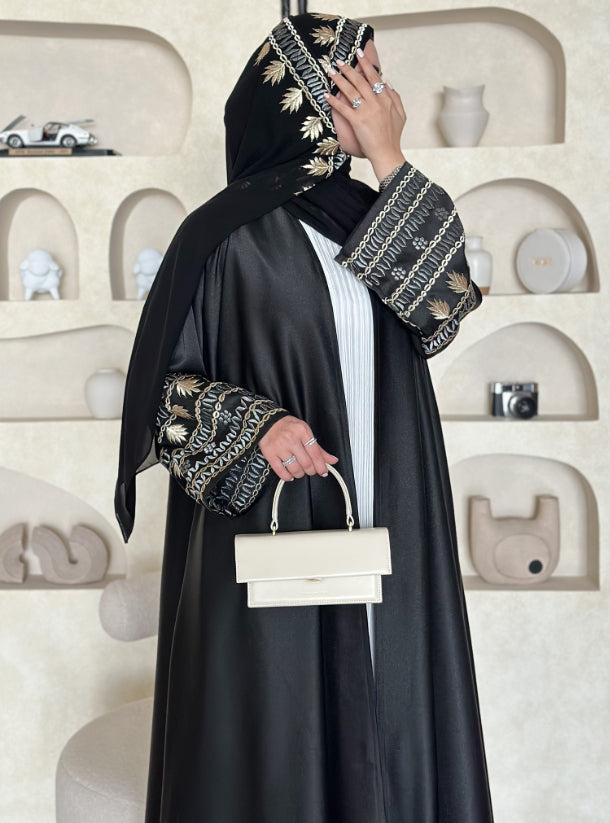 Gold And Silver luxurious abaya adorned with embroidery