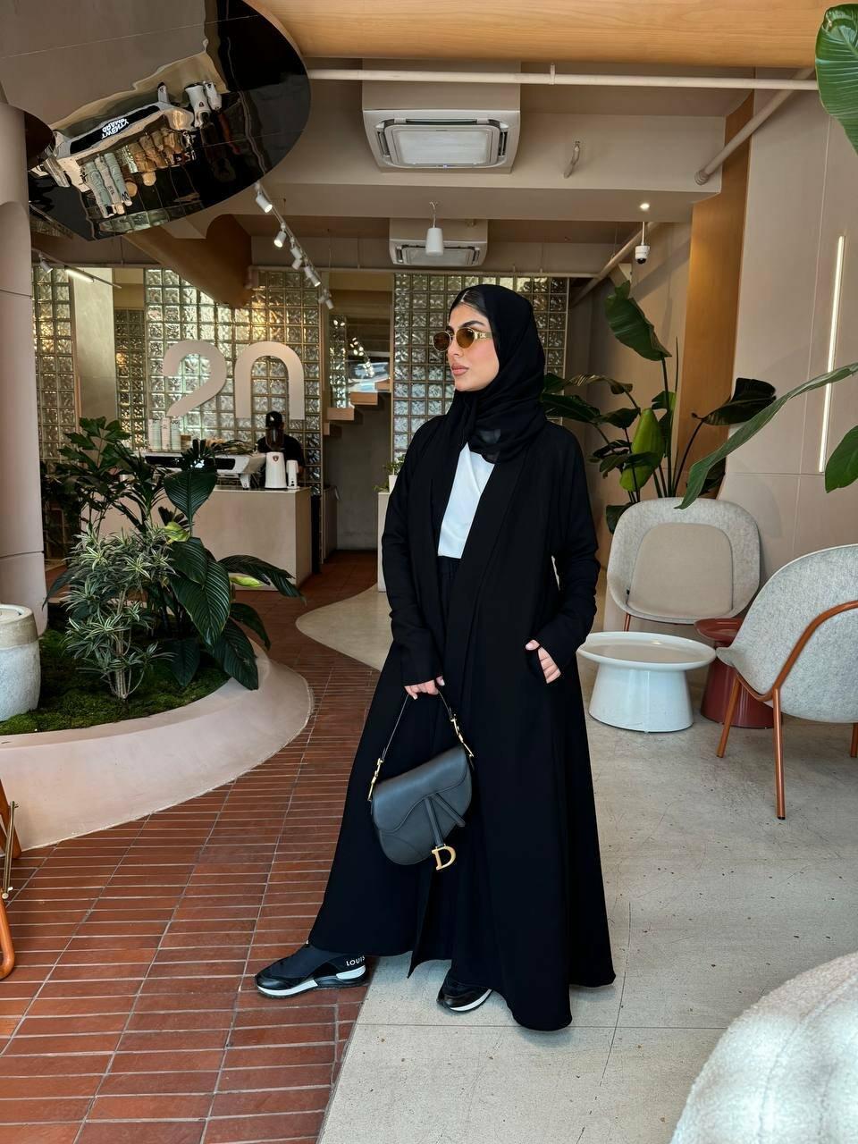 Black Crepe abaya with pleated back and fitted sleeves