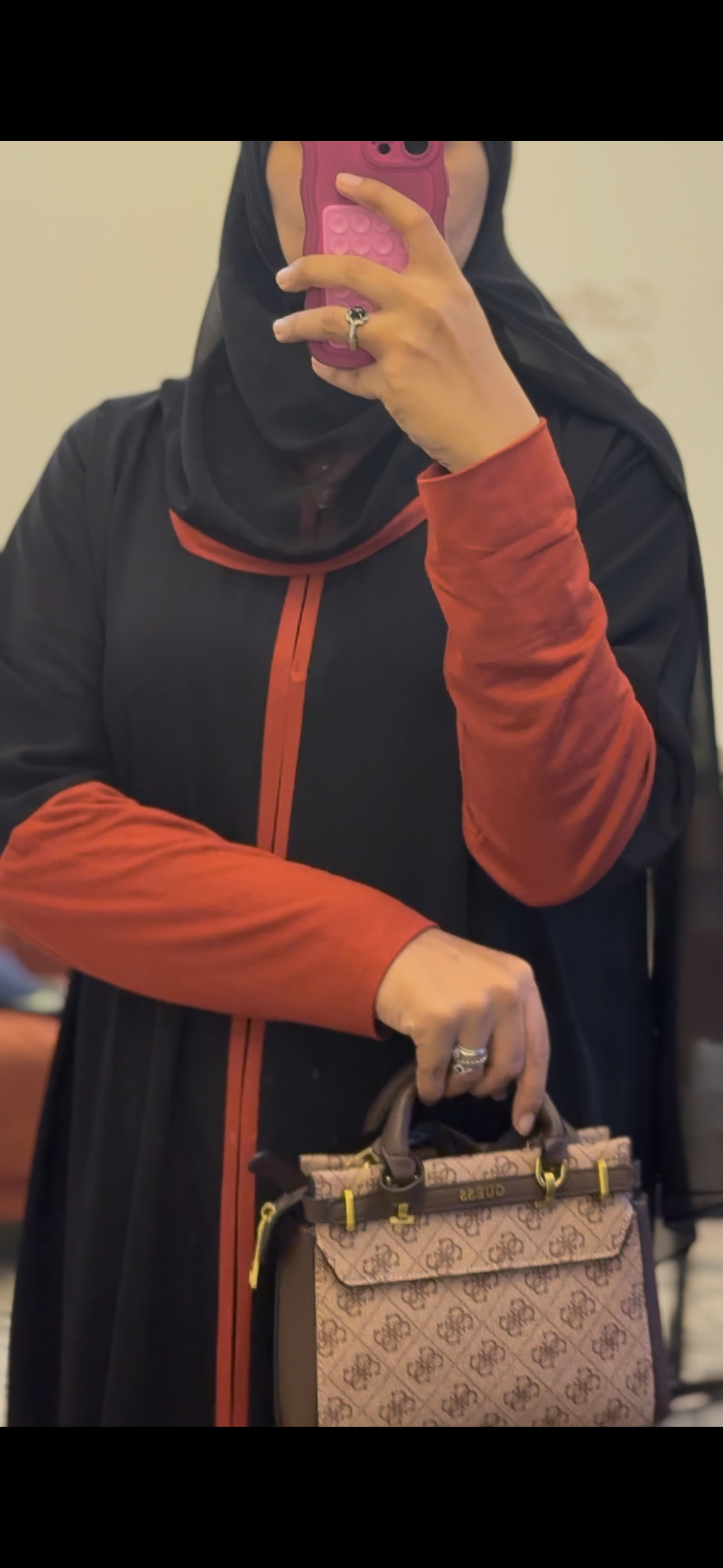 Black Nada Abaya with Jersy sleeves, burnt orange