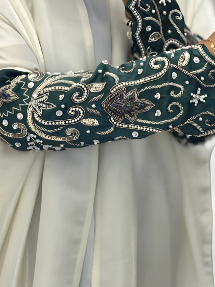 Ivory Grace with Embellished Emerald Sleeves